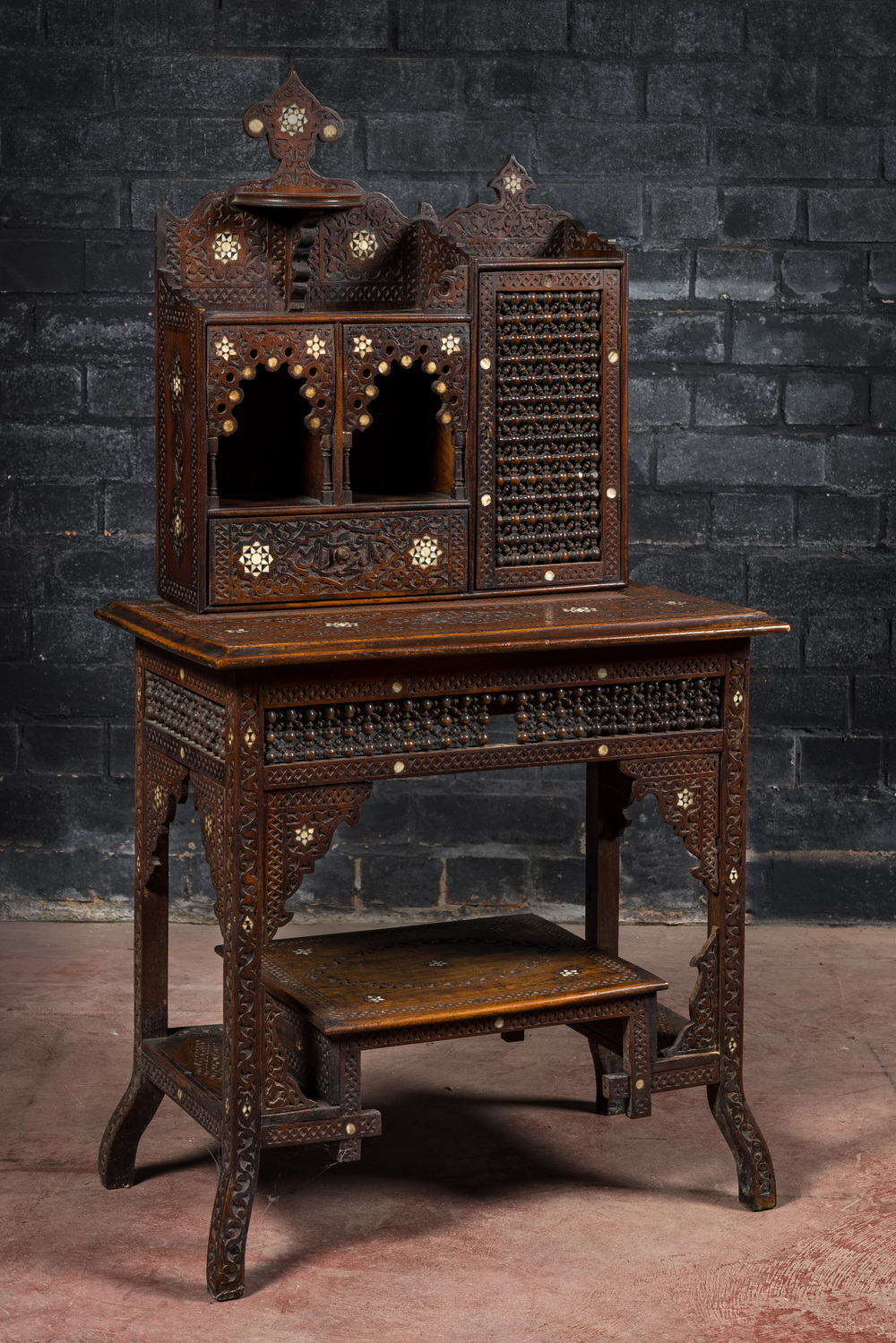 A mother-of-pearl-inlaid wooden wall console, North-Africa, 19/20th C.