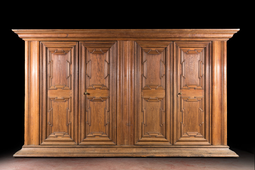A large German oak wooden four-door wardrobe, 18th C.