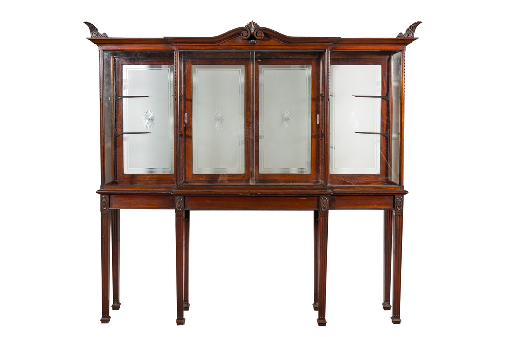 A neoclassical mahogany shop display cabinet with etched glass backdrops, England, ca. 1900