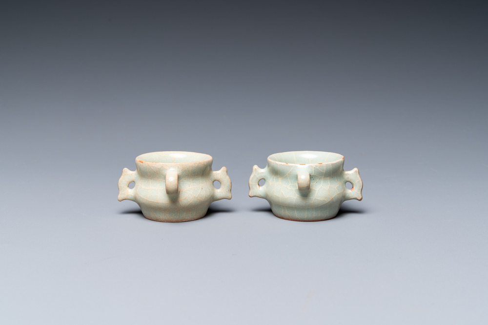 A pair of Chinese Longquan celadon bird feeders, Ming