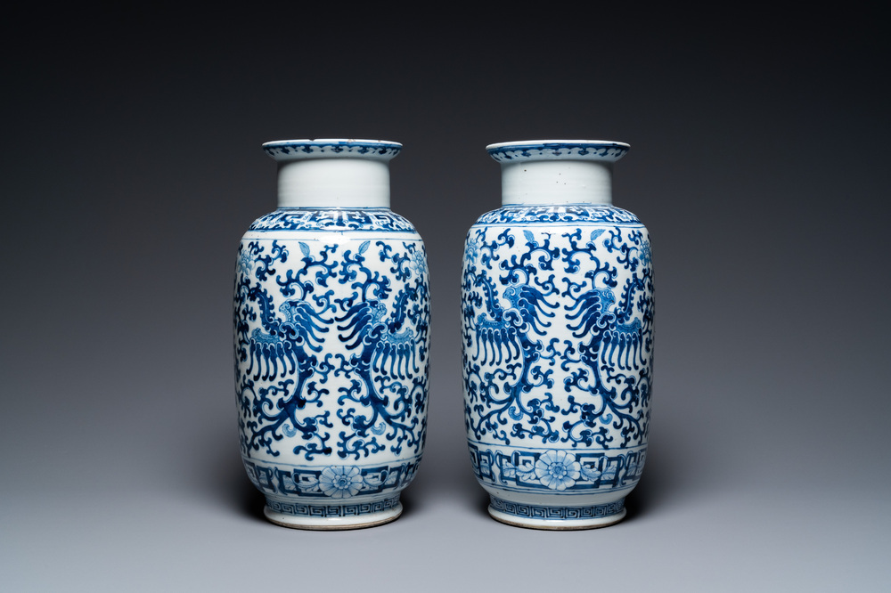 A pair of Chinese blue and white 'phoenix' vases, Kangxi mark, 19th C.