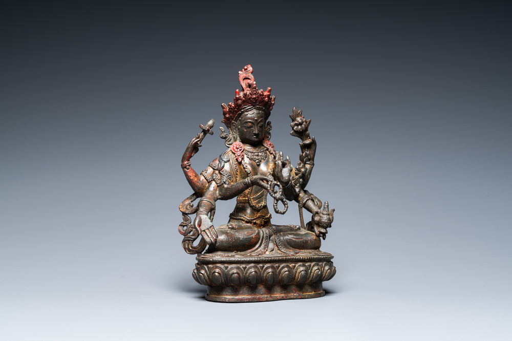 A Sino-Tibetan gilt-lacquered bronze Vasudhara, 17th C.