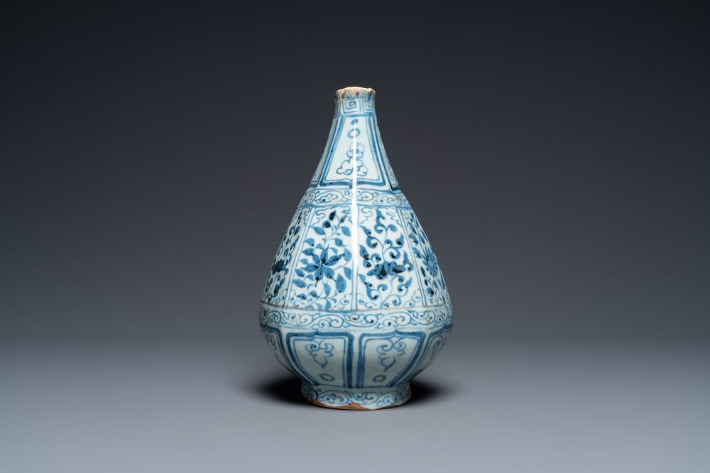 A Chinese blue and white octagonal bottle vase with floral design, Hongwu