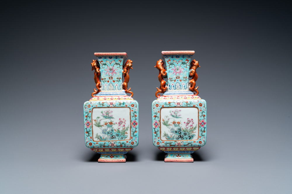 A pair of Chinese famille rose turquoise-ground vases, Qianlong mark, 19/20th C.