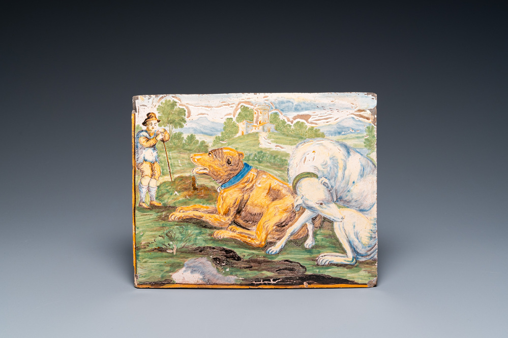 Plaque en fa&iuml;ence de Castelli polychrome figurant un berger et deux grands chiens, Italie, 18&egrave;me