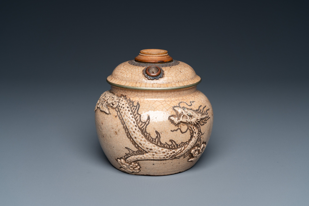 A Vietnamese copper-mounted Bat Trang stoneware water pipe, 19th C.