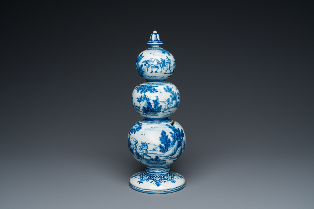 An exceptional Dutch Delft blue and white triple gourd money bank, early 18th C.