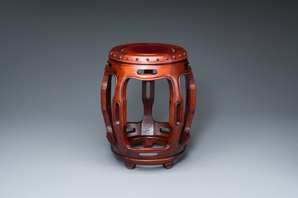 A Chinese wooden drum-form stand or seat, 19/20th C.