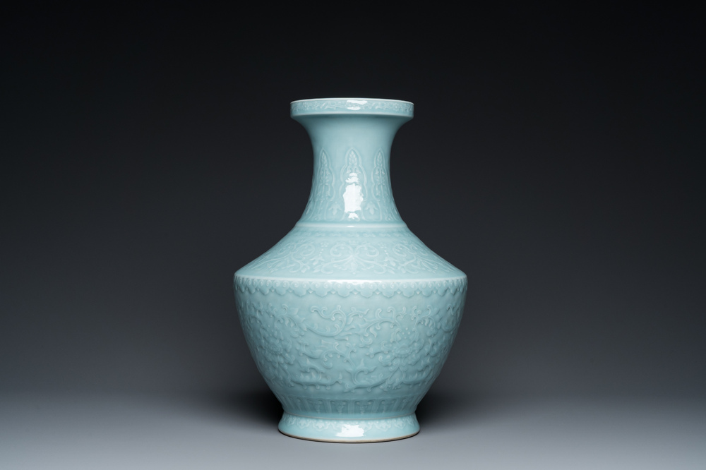 Een Chinese monochrome clair-de-lune-geglazuurde 'hu' vaas met lotusslingers, Qianlong merk maar wellicht later