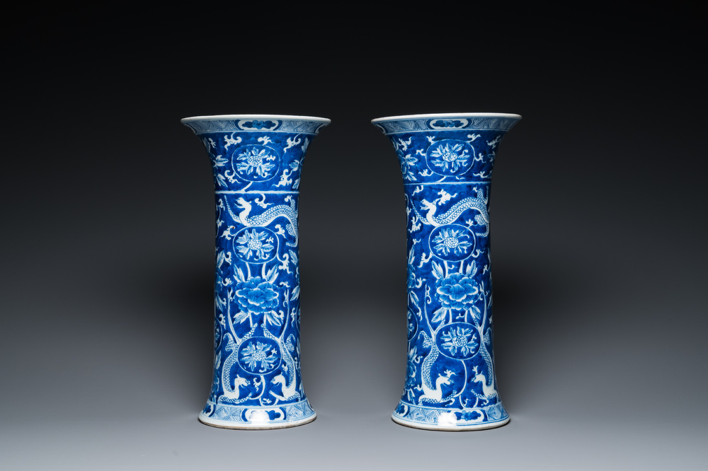 A pair of Chinese blue and white vases with dragons, 19th C.