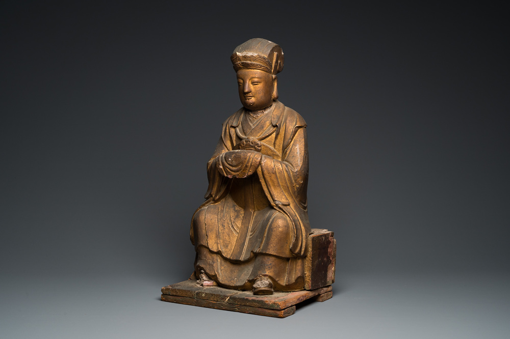 A large Chinese gilded stucco and wood sculpture of the Taoist Jade Emperor, 17th C.