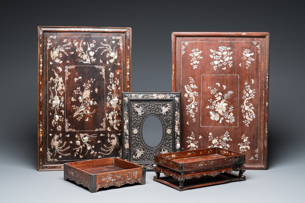 Two mother-of-pearl-inlaid wooden trays, two opium trays and an oval frame, China and/or Vietnam, 19th C.