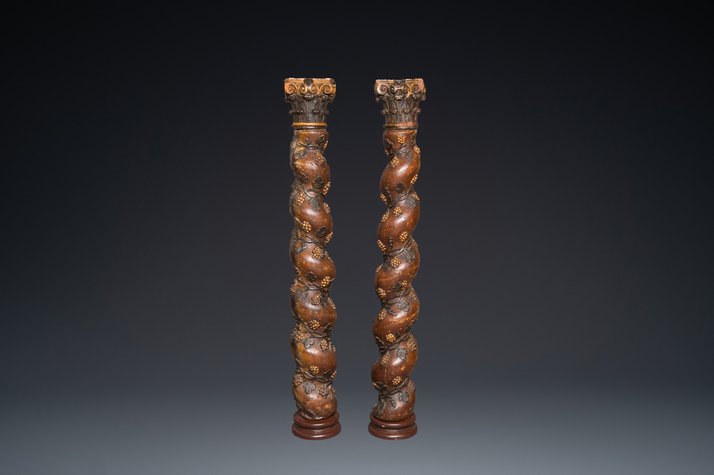 A pair of patinated wooden 'grapevine' columns, 18th C.