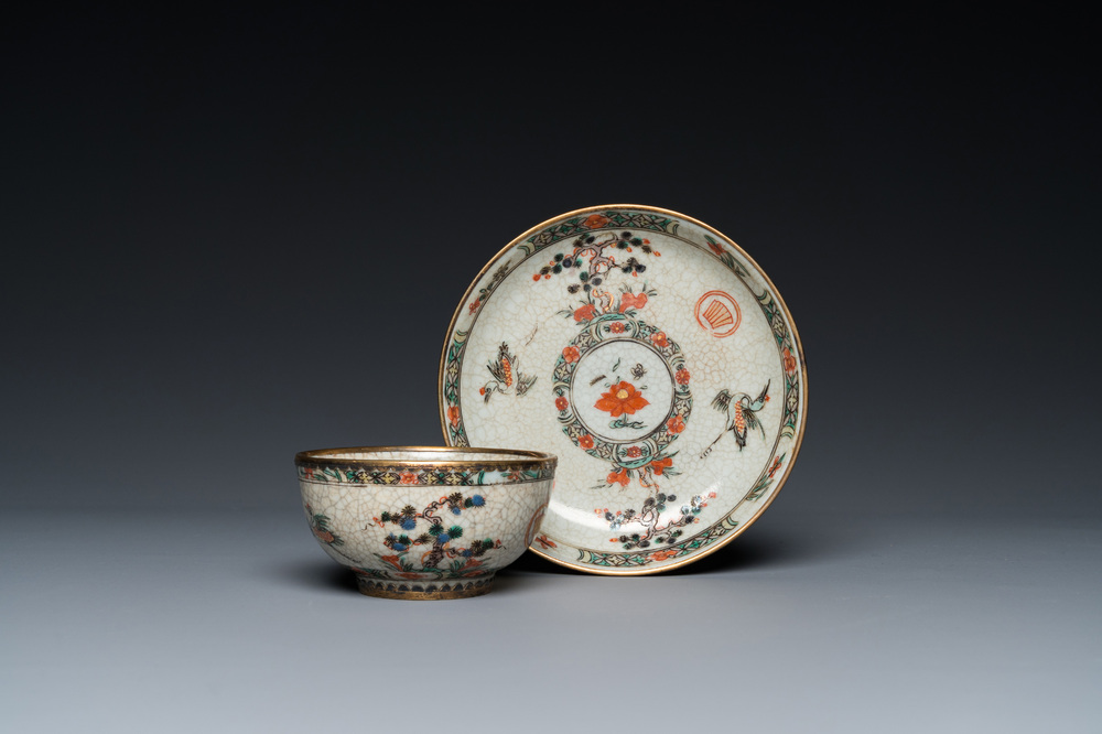 An unusual Chinese famille verte crackle-ground cup and saucer with gilt brass mounts, Kangxi