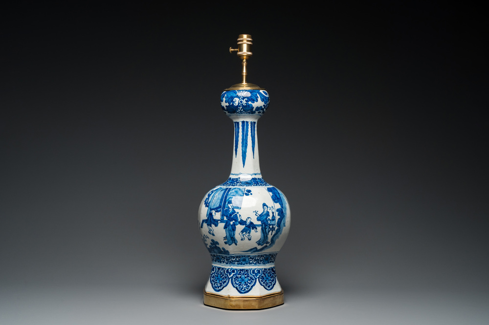 A large Dutch Delft blue and white chinoiserie vase mounted as a lamp, 1st quarter 18th C.