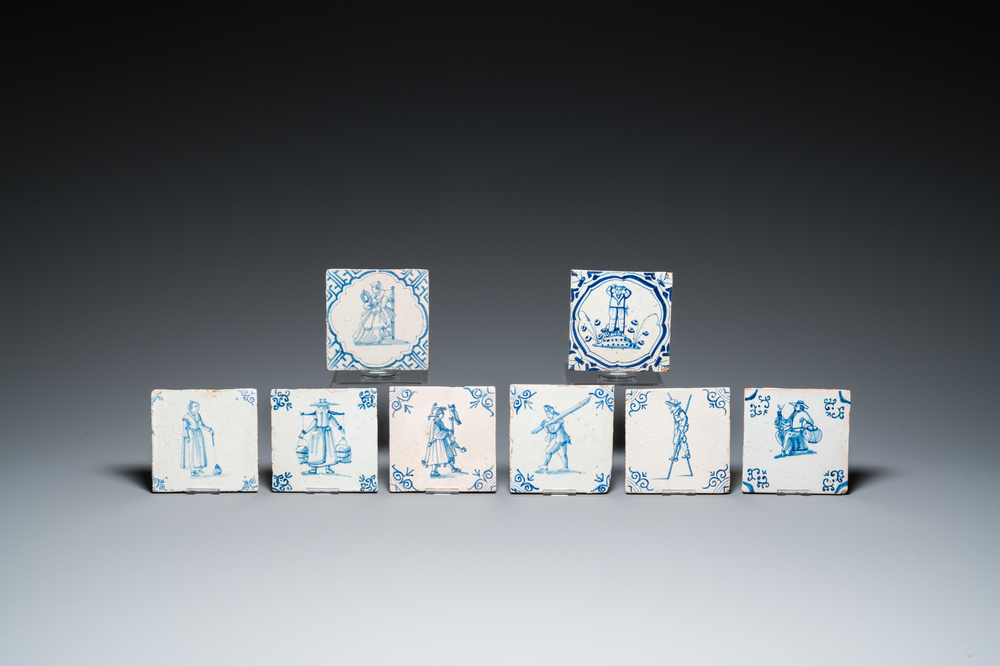 Eight Dutch Delft blue and white tiles with mostly craftsmen at work and playing children, 17th C.