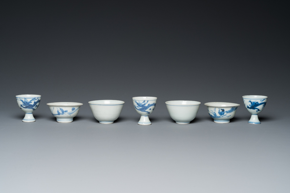 Four Chinese blue and white 'Hatcher cargo' bowls and three stem cups, Transitional period