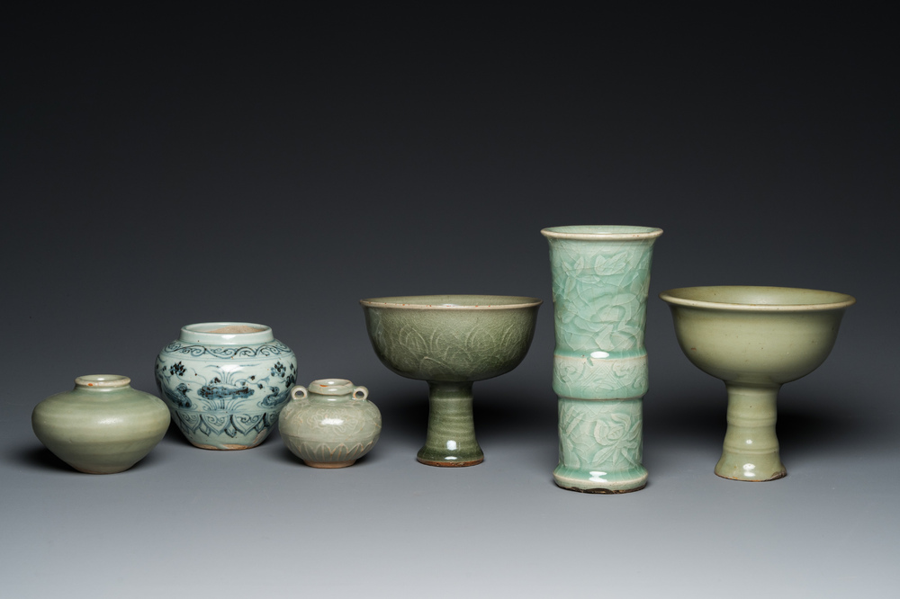 Three Chinese celadon-glazed vases, two stem cups and a blue and white vase, Ming