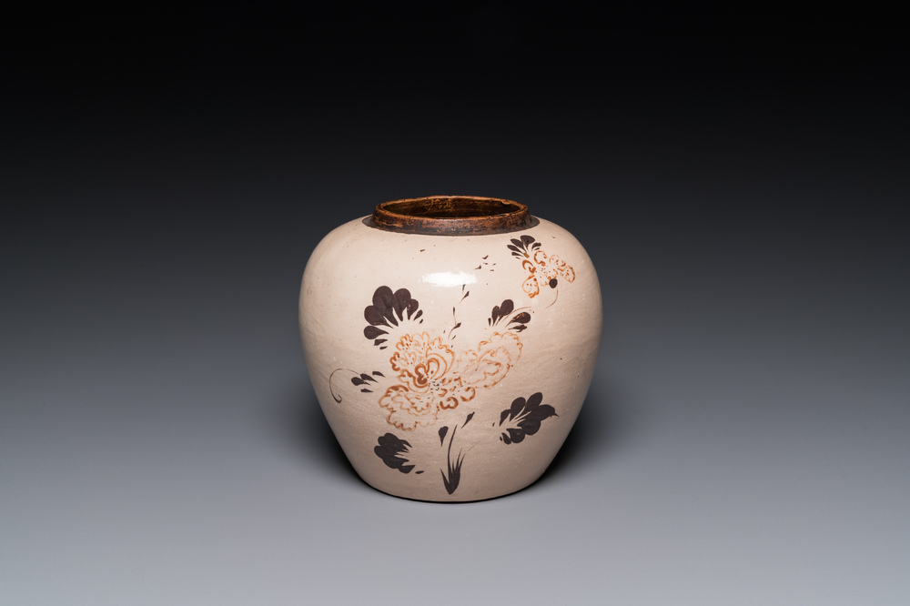 A Chinese red and black-decorated Cizhou jar with floral design, Ming