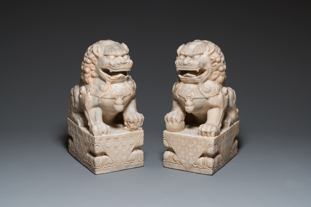A pair of large Chinese white marble Buddhist lions, 19th C.