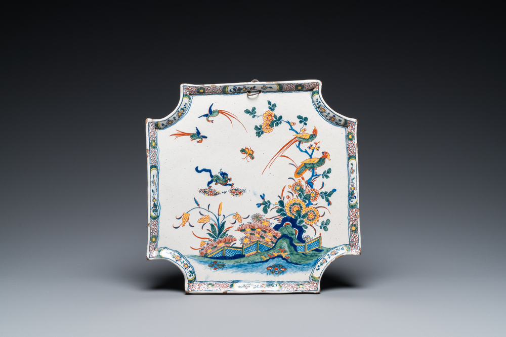 A polychrome Dutch Delft Kakiemon-style plaque with a tiger in a Japanese garden, 18th C.