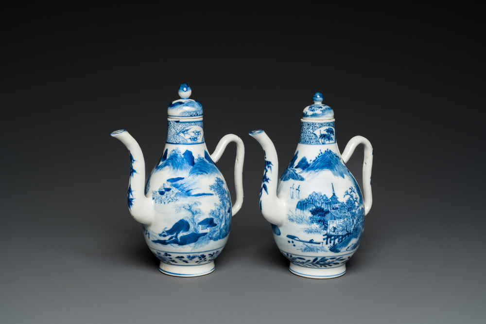 A pair of Chinese blue and white 'landscape' ewers and covers, possibly for the Vietnamese market, 19th C.