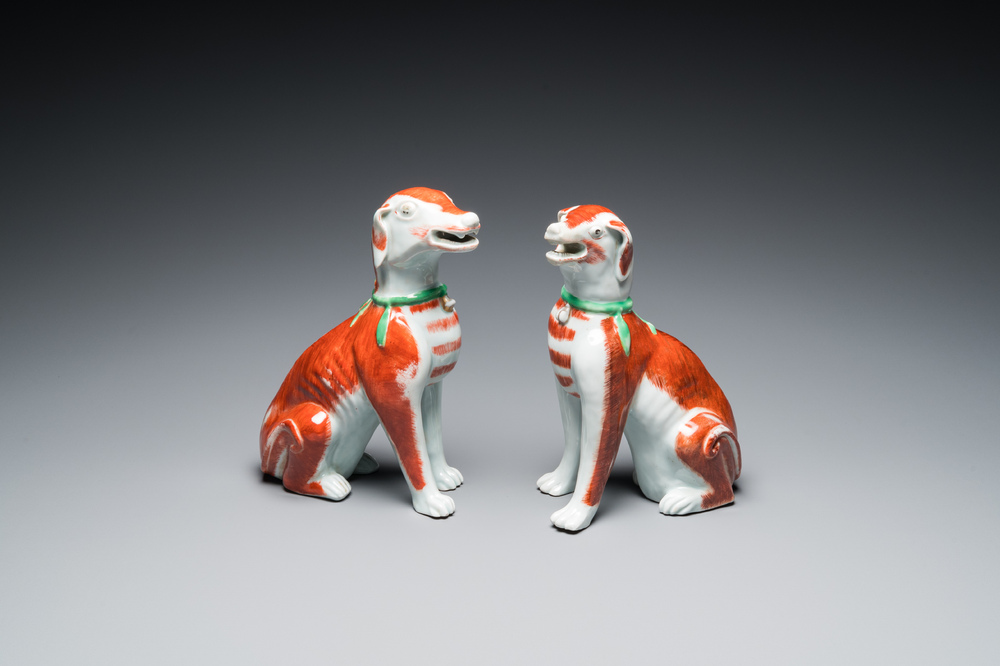 A pair of Chinese polychrome export porcelain models of dogs, Qianlong