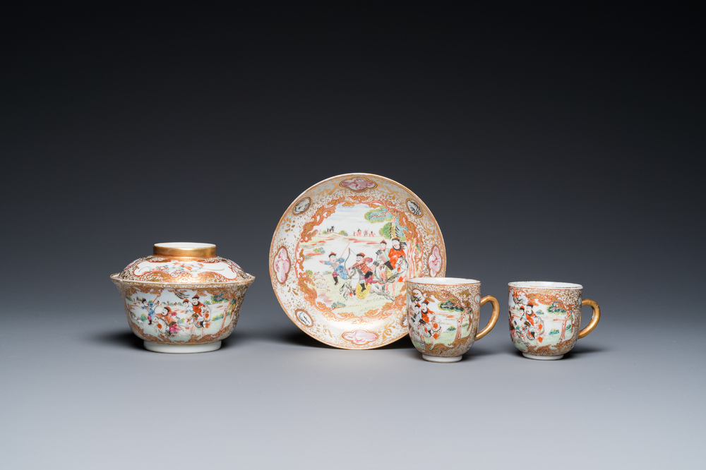 A Chinese famille rose covered bowl, a saucer and two cups with a hunting scene, Qianlong