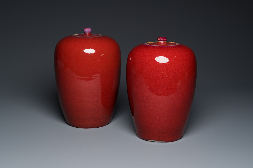 A pair of Chinese sang-de-boeuf-glazed covered jars, 19th C.