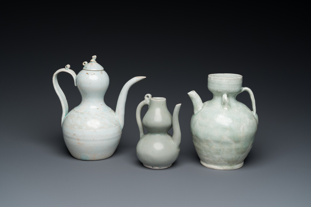 Three Chinese celadon- and qingbai-glazed jugs, Song and later