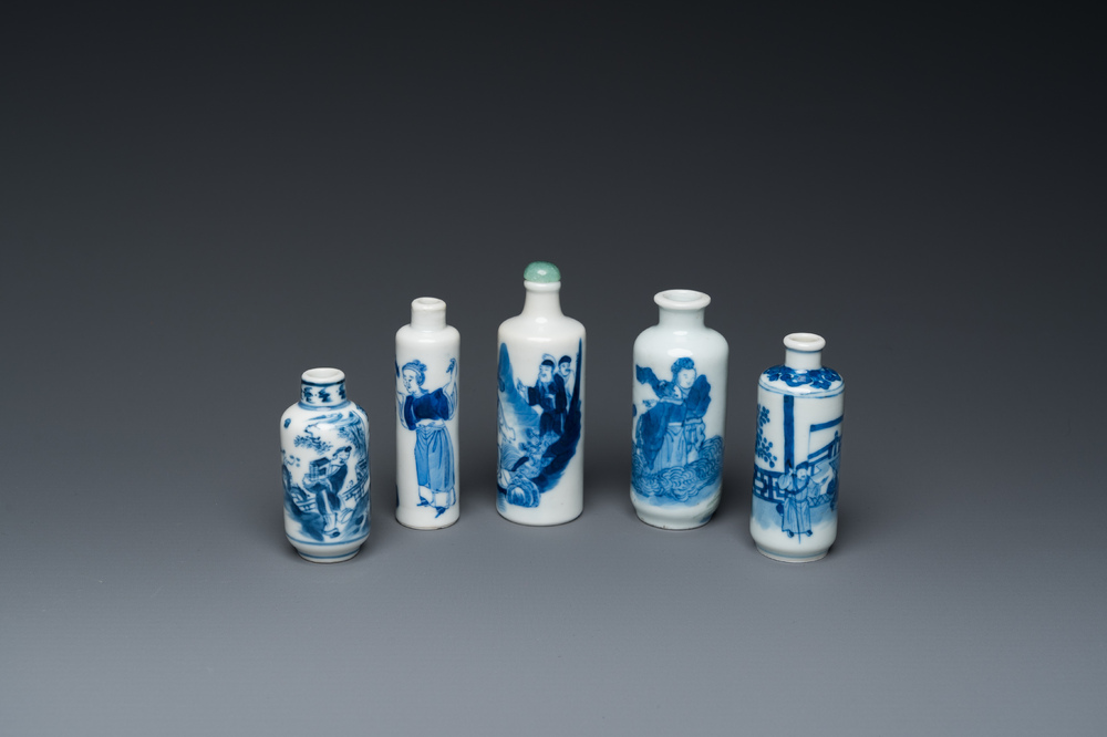 Five Chinese blue and white snuff bottles, 19th C.