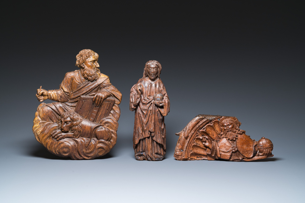 Two carved oak reliefs of Christ and one of Saint Mark, 15/16th C.