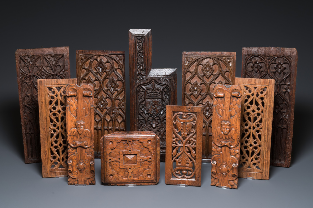 A collection of 11 carved wooden panels with various designs, France, Holland and/or Flanders, 14/16th C.