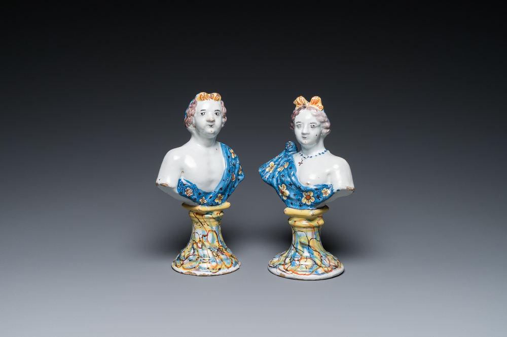 A pair of polychrome Dutch Delft busts on bases imitating marble, 18th C.