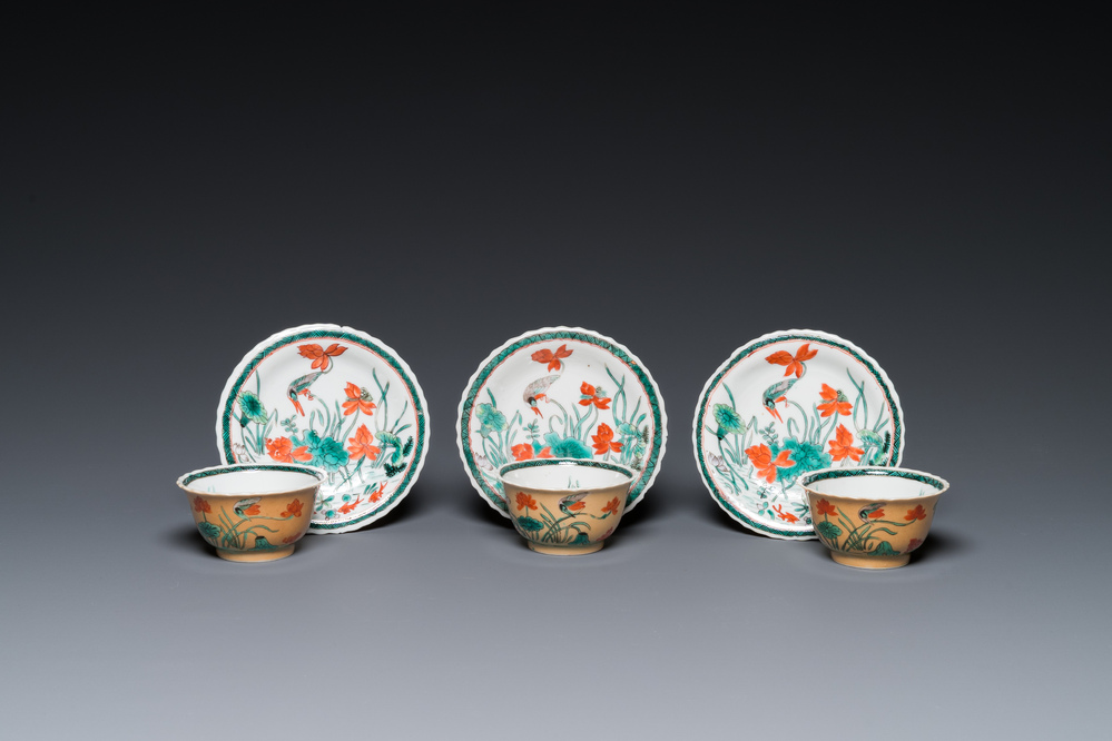 Three Chinese Kangxi-style caf&eacute;-au-lait-ground famille verte cups and saucers, rabbit mark, 19th C.