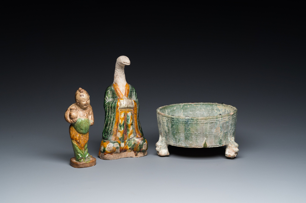 Two Chinese sancai-glazed figures and a green-glazed tripod censer, Han and later