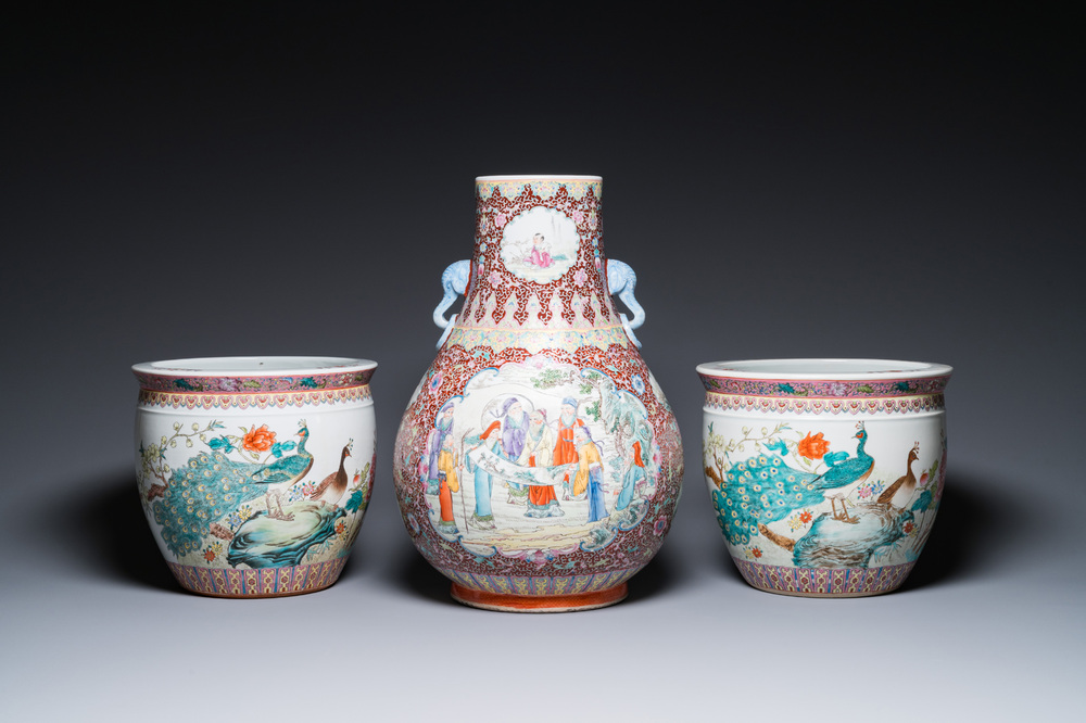 A Chinese famille rose 'hu' vase and a pair of fish bowls, 20th C.