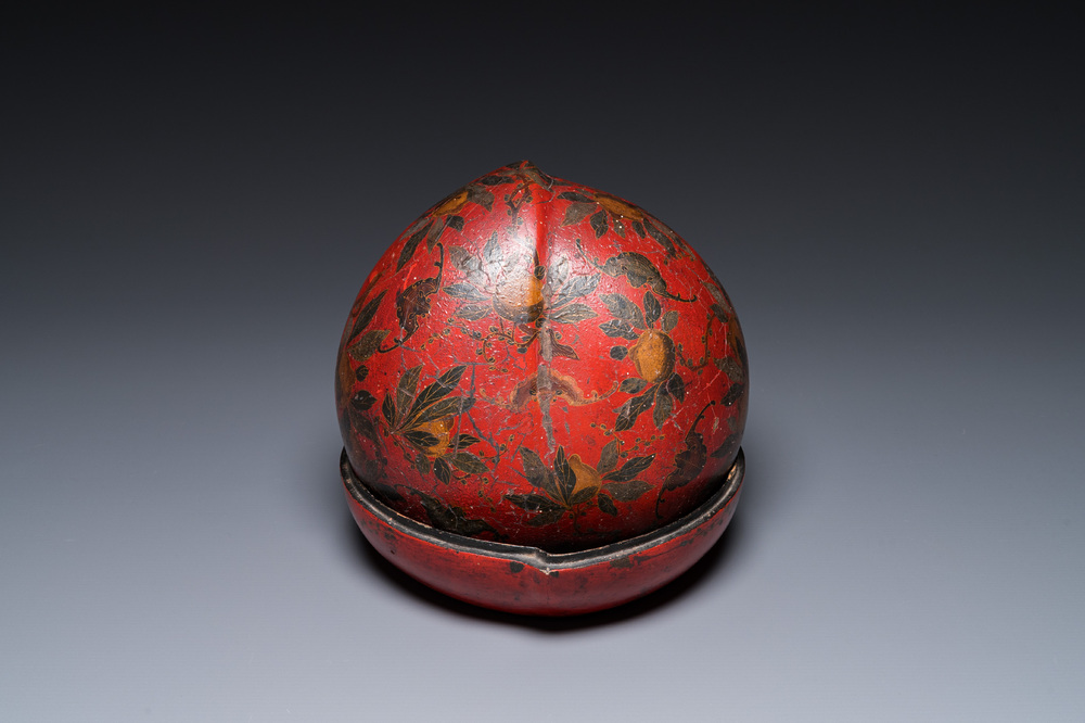 A Chinese peach-shaped painted lacquer box and cover, Qing