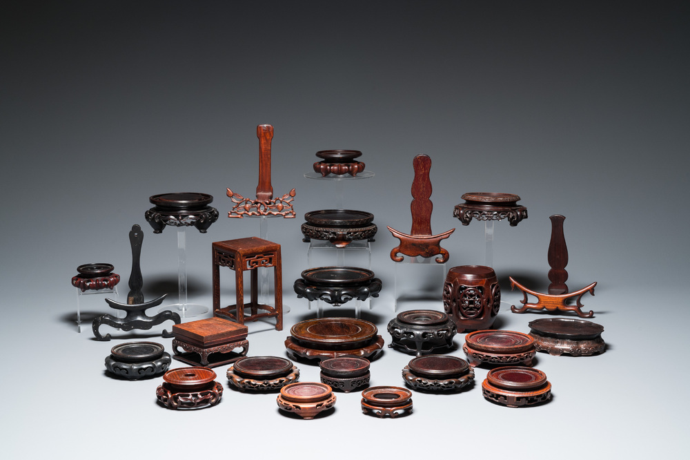 A collection of 25 fine Chinese wooden stands, 19/20th C.