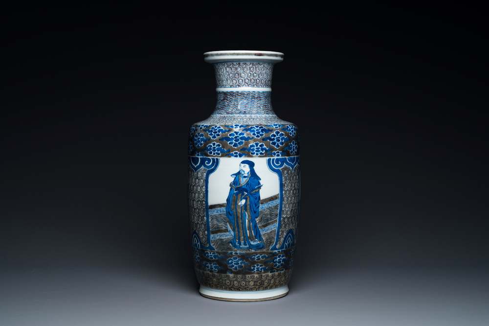 A Chinese blue, white and copper-red 'Sanxing' rouleau vase, Kangxi