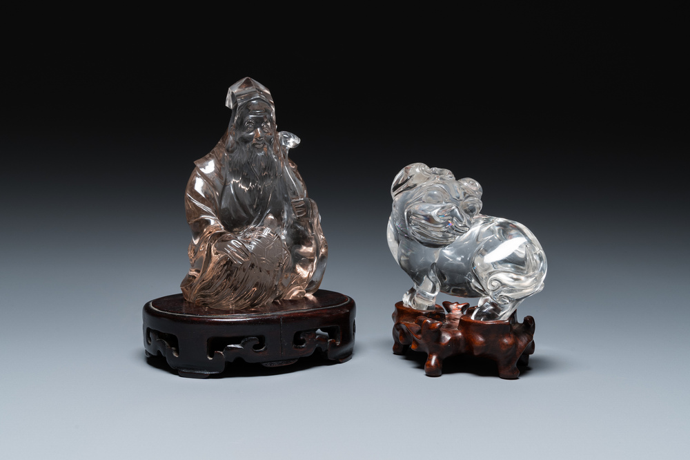 Two Chinese rock crystal sculptures of a sage with a turtle and of a Buddhist lion, 19th C.