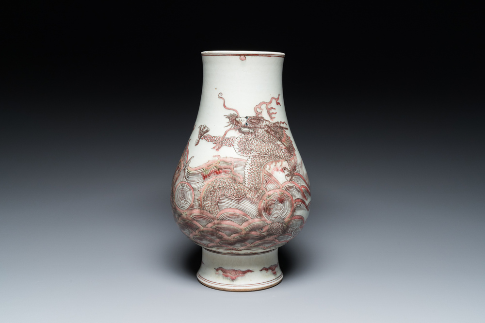 A Chinese copper-red 'dragon and carp' vase, Kangxi mark, 20th C.