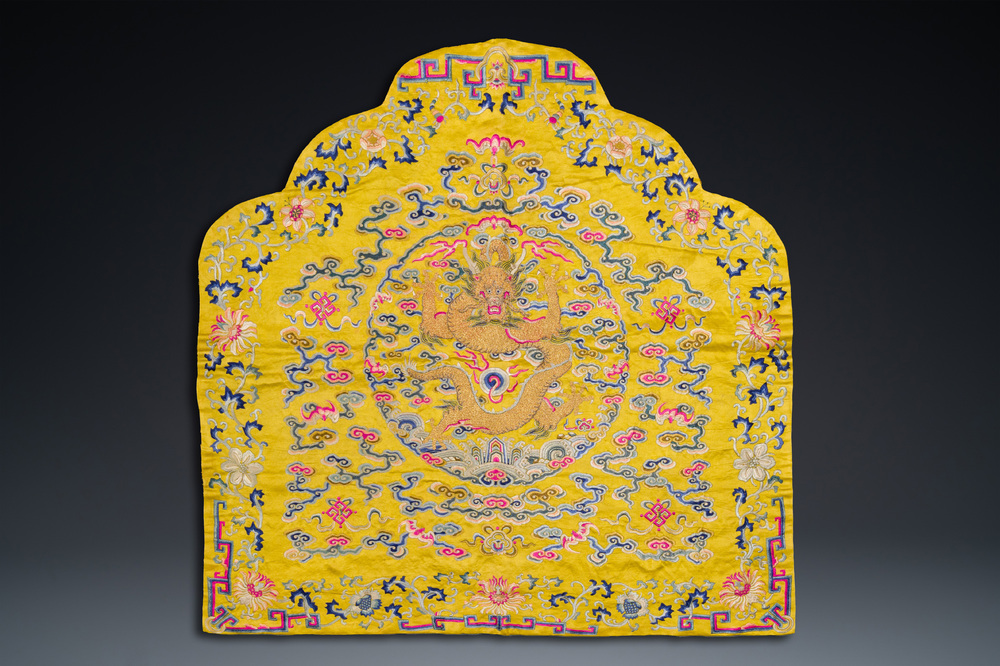 An imperial Chinese embroidered silk gold-thread yellow-ground cushion ...