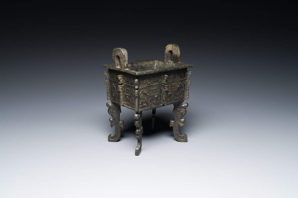 A Chinese archaic bronze ritual food vessel in Western Zhou-style, 'fangding', Bao Ding Zhen Yong 寶鼎珍用 mark, Ming