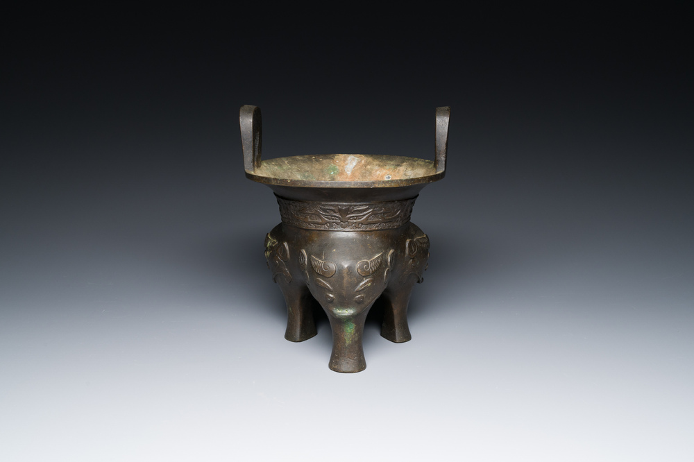 A Chinese archaic bronze tripod censer, 'ding', Ming