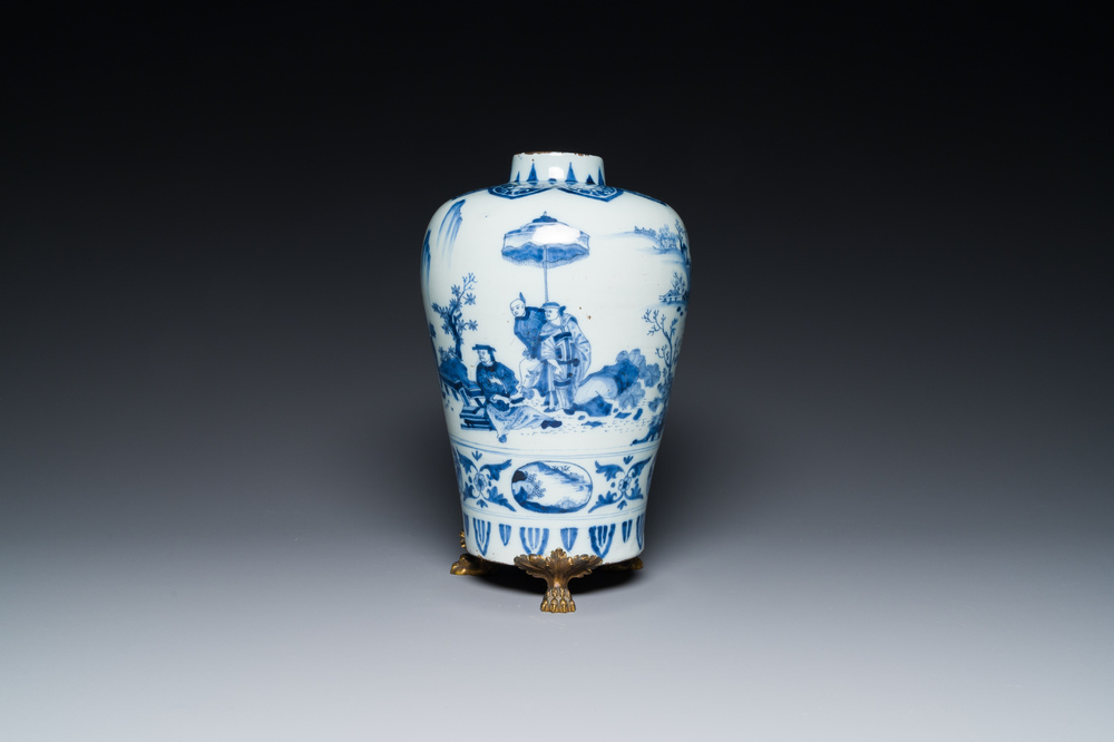 A fine Dutch Delft blue and white Transitional style chinoiserie vase on a gilt bronze stand, late 17th C.