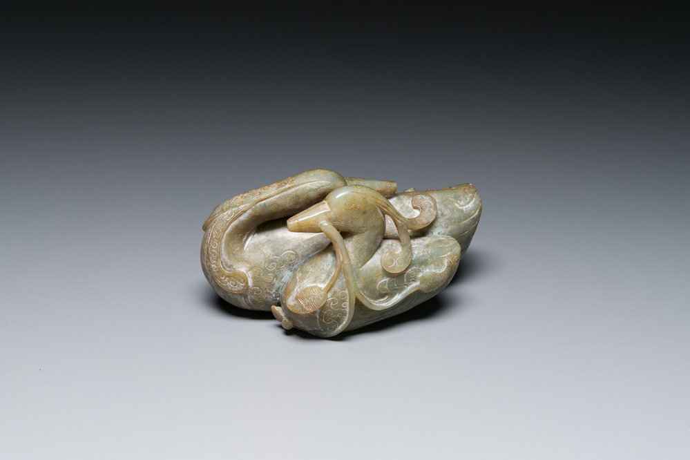 A Chinese celadon jade group of two mandarin ducks, Ming