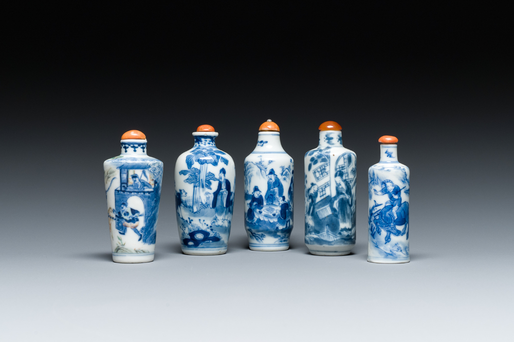 Five Chinese blue, white and wucai snuff bottles, 19th C.