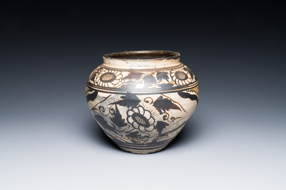 A Chinese Cizhou pottery jar with floral design, Song