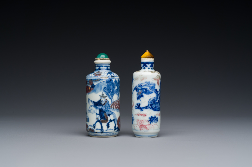 Two Chinese blue, white and copper-red snuff bottles, 19th C.